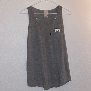 A loose fitting gray tank top.